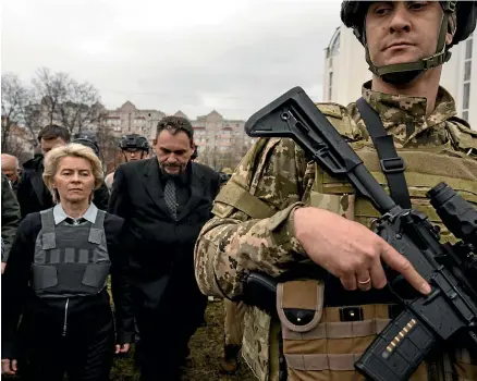  ?? AP ?? Ursula von der Leyen, European Commission President, left, during her visit to a mass grave in Bucha, on the outskirts of Kyiv, on Friday.