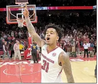  ?? NWA Democrat-Gazette/ANDY SHUPE ?? Senior guard Anton Beard and Arkansas improved to 7-2 on the season with Saturday’s 95-79 thumping of No. 14 Minnesota at Walton Arena in Fayettevil­le.