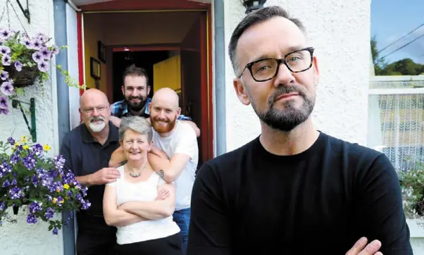  ??  ?? FOUR’S A CROWD: Brendan Courtney, presenter of ‘This Crowded House’, with Andy and Daithi Kennedy, who are back living with their parents