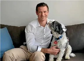  ?? DANIELLE CLENT/STUFF ?? National Party candidate for Helensvill­e Chris Penk and his 5-year-old dog Barkley.
