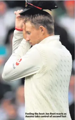  ??  ?? Feeling the heat: Joe Root reacts as Aussies take control of second Test