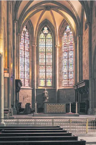  ??  ?? The choir windows of Tholey Abbey in Tholey, Germany, with a new design by Gerhard Richter.