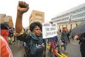  ?? GERALD HERBERT AP ?? Protesters march Saturday in Memphis, Tenn., over the death of Tyre Nichols.