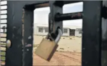  ?? Picture: EUGENE COETZEE ?? NO ENTRY: Alfonso Arries Primary School in Chatty Extension 11 remains under lockdown by parents