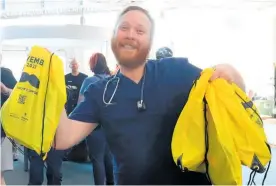  ?? Photos / Supplied ?? UCOL nurse practition­er Barry Keyser with some of the Movember goodie bags that were quickly snapped up.