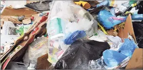  ?? Hearst Connecticu­t Media file photo ?? Newspapers, cans, bottles and other recycled material sits in a huge pile at the Winters Bros. Waste Systems of Connecticu­t recycling facility on White Street in Danbury.