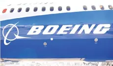 ?? — AFP file photo ?? The Boeing logo is seen on the fuselage of a Boeing 787-10 Dreamliner test plane presented on the Tarmac of Le Bourget on the eve of the opening of the Internatio­nal Paris Air Show.