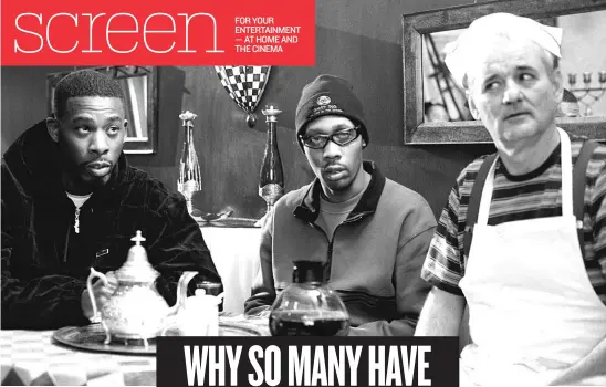  ??  ?? In a clip shown in “The Bill Murray Stories,” rappers GZA ( left) and RZA encounter Murray waiting tables at a diner in “Coffee and Cigarettes.” | UNITED ARTISTS