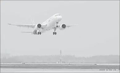  ??  ?? China’s homegrown large passenger plane C919 takes off on its maiden flight in Shanghai, east China.(Photo: Xinhua)