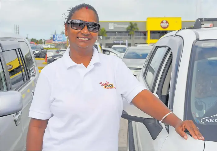  ?? Picture: RUSIATE VUNIREWA ?? Former cook turned taxi driver Neelam Prasad encourages women of all ages to give the driving profession a go.