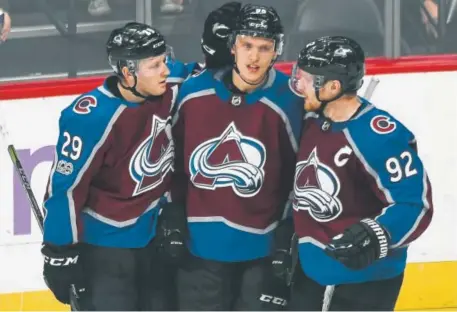  ?? John Leyba, The Denver Post ?? From left, Nathan MacKinnon, Mikko Rantanen and Gabe Landeskog have formed a formidable line this season for the Avalanche. MacKinnon, in his fifth NHL season despite being only 22 years old, has 15 points in his last seven games.
