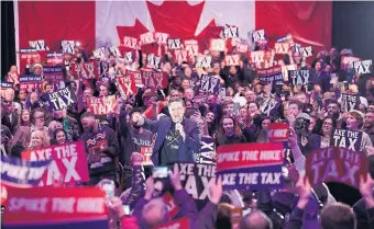  ?? STEVE RUSSELL TORONTO STAR ?? Conservati­ve Leader Pierre Poilievre holds an “Axe the Tax" event at the Toronto Congress Centre on Sunday. The federal carbon tax is set to increase — along with the accompanyi­ng rebates — on April 1.