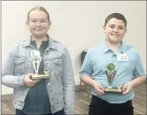  ?? Submitted Photo ?? Hannah Baker, left, won the Cross County Spelling Bee, held recently at the Technology Center for the Delta Exhibit Hall in Wynne. The first runner-up was Axel Davis.