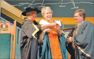  ?? ELIZABETH PATTERSON/CAPE BRETON POST ?? Cape Breton University chancellor Annette Verschuren, left, and Dr. Dale Keefe, CBU’s president and vice-chancellor, right, present Dr. Roberta Bondar, centre, with an honorary doctorate of letters from the university on Saturday at a special...