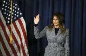  ?? MATT ROURKE — THE ASSOCIATED PRESS ?? First lady Melania Trump waves as she leaves the stage during a visit to Thomas Jefferson University Hospital in Philadelph­ia, Wednesday.