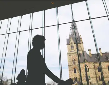  ?? SEAN KILPATRICK / THE CANADIAN PRESS ?? Prime Minister Justin Trudeau leaves a press conference in Ottawa last month. Trudeau is facing pressure from some observers to rein in record-high spending levels.