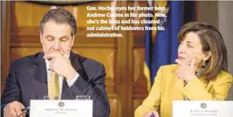  ?? ?? Gov. Hochul eyes her former boss Andrew Cuomo in file photo. Now, she’s the boss and has cleaned out cabinet of holdovers from his administra­tion.