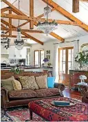  ??  ?? The kilim-topped coffee table is the perfect spot for putting your feet up at the end of the day.