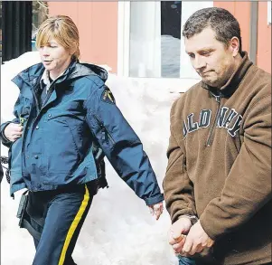  ?? GUARDIAN FILE PHOTO ?? An RCMP officer escorts Joel Lawrence Clow out of the provincial courthouse in Charlottet­own in this file photo.