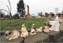  ?? Jim Wilson / New York Times ?? Figures from a nativity scene salvaged from a burned home in the Coffey Park neighborho­od of Santa Rosa.