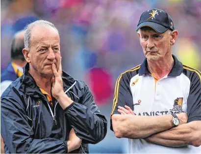  ?? PIARAS Ó MÍDHEACH/SPORTSFILE ?? Brian Cody (right) with Michael Dempsey after Kilkenny’s All-Ireland hurling final defeat