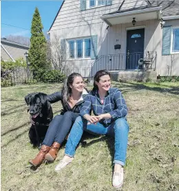  ?? PETER MCCABE ?? First-time buyers Terri Rindress, left, and Anita Trudel purchased their home in Pointe-Claire after being priced out of NDG.