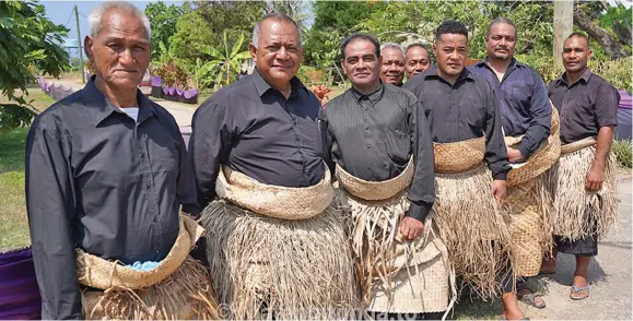  ?? Photo: Eleanor Gee ?? Matapules gather at the entrance to the late Lord Ma’afu’s residence, at Vaini on December 30, 2021.