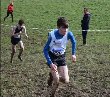  ??  ?? Joe Byrne (Gorey C.S.) tackles Heartbreak Hill in the tough conditions at Carriganor­e.