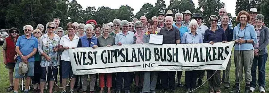  ??  ?? West Gippsland Bush Walkers Club members assembled at Rokeby Park showing off their new GPS units and the certificat­e issued by the Shire Council acknowledg­ing their successful small equipment grant applicatio­n.