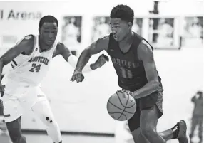  ??  ?? Bartlett’s Rodney Mason drives through the lane against Meadowcree­k during the Memphis Hoopfest at Briarcrest Christian School on Jan. 4. JOE RONDONE/THE COMMERCIAL APPEAL