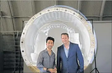  ?? Anne Cusack Los Angeles Times ?? CO-FOUNDERS Bibop Gresta, left, and Dirk Ahlborn hope to bring Hyperloop Transporta­tion Technologi­es’ experiment­al transporta­tion service to China. The company envisions capsules shuttling people in tubes.