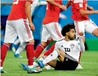  ?? AP ?? Egypt’s Mohamed Salah gestures after he was fouled during a World Cup match against Russia. —
