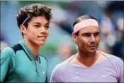  ?? AP/PTI ?? Darwin Blanch of United States (left) and Rafael Nadal of Spain pose before their match during Madrid Open tennis tournament