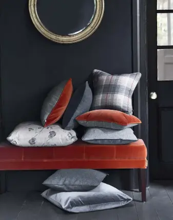  ??  ?? ABOVE Rupert stool upholstere­d in Isla Fox, £345; Fleming small mirror, £125; Florence cushion in Lorne Plaid, £67 BELOW LEFT Keswick square side table, £415
BELOW Lorne fabric, £72/m