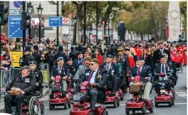  ?? ?? Power and glory... Veterans get motorised to help them to the Cenotaph. Inset, Joe Cattini, 98, enjoys the ceremonies