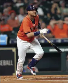  ?? AP
PHOTO/DAVID J. PHILLIP ?? Houston Astros’ Yuli Gurriel watches his grand slam against the Los Angeles Angels during the first inning of a baseball game on Friday, in Houston.