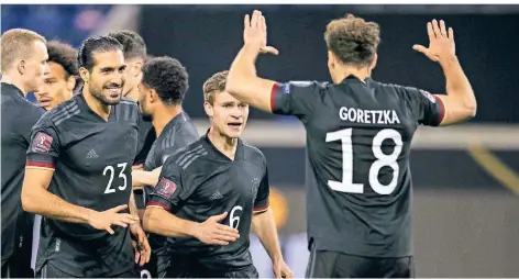  ?? FOTO: MORITZ MÜLLER/IMAGO ?? Emre Can (von links), Joshua Kimmich und Leon Goretzka jubeln beim Spiel gegen Island.