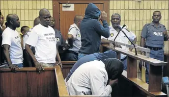  ?? PHOTO: VATHISWA RUSELO ?? VICTIMS OR VILLAINS? Three policemen caught on CCTV killing Khulekani Mpanza appear in court for bail applicatio­ns