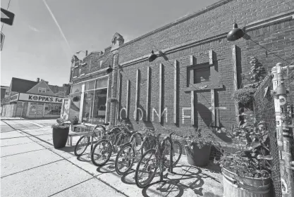  ?? CASEY/MILWAUKEE JOURNAL SENTINEL EVAN ?? A sure sign Thursday morning that Comet Cafe had reopened on the east side: Bicycles filled the bike rack.