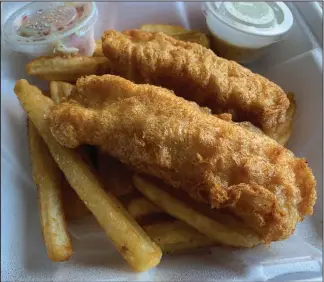  ?? (Arkansas Democrat-Gazette/Eric E. Harrison) ?? Oh my cod! Fish and chips is a must menu item for any pub, and we enjoyed ours from Cregeen’s Irish Pub in North Little Rock’s Argenta District.