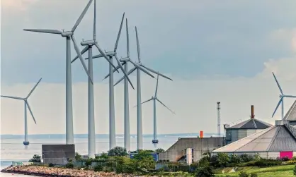 ?? Photograph: Alamy ?? A wind farm in Copenhagen. The report said Denmark was on course to cut emissions by the equivalent of 7.2m tonnes of CO2 by 2030, lower than its target.