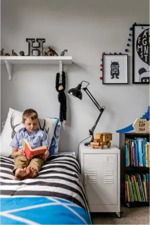  ??  ?? HUNTER & CHARLIE’S ROOM The boys’ duvet covers are by Aura by Tracie Ellis; Hunter leans on a cushion from Linens & More. A bedside cabinet by General Eclectic paired with a lamp from Farmers adds a hint of the industrial. Below, collected treasures...