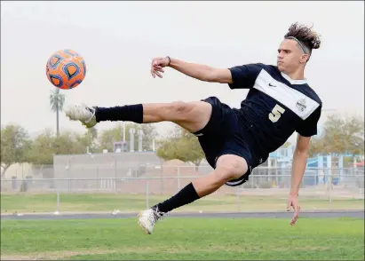  ?? Buy this photo at YumaSun.com PHOTO BY RANDY HOEFT/ YUMA SUN ?? CIBOLA SENIOR FORWARD GABRIEL CLAUDIO is the 201617 Yuma Sun/Yuma Rotary Club Boys Soccer Player of the Year after totaling 23 goals and 14 assists on the season while leading the Raiders to a 6A Southern region title and an appearance in the 6A state...