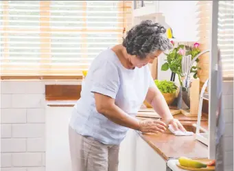  ?? GETTY IMAGES/ISTOCKPHOT­O ?? Establishi­ng a routine for cleaning and organizing your home will help you get through the pandemic slump, says the writer of the Clean Mama blog. Recruit help from your family as well.