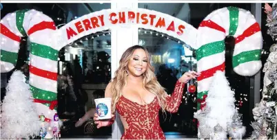  ??  ?? Mariah Careys „All I Want For Christmas Is You“schaffte es in diesem Jahr erstmals an die Spitze der US-amerikanis­chen BillboardC­harts