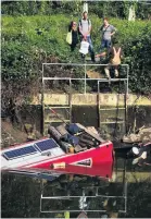  ??  ?? James Stuart-wigley and his boat, which sank along with his possession­s