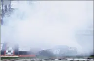  ?? Sean Gardner / Getty Images ?? Alex Bowman does a burnout after winning the NASCAR Cup Series Toyota Owners 400 at Richmond Raceway on Sunday in Ricmond, Va.