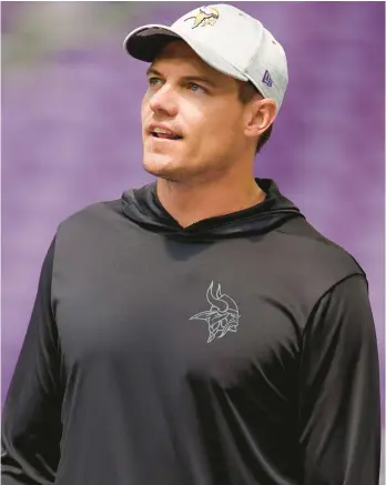  ?? ABBIE PARR/AP ?? Vikings head coach Kevin O’Connell looks on during the team’s training camp on Friday at U.S. Bank Stadium in Minneapoli­s.