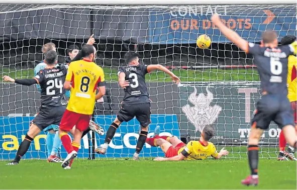  ??  ?? Dundee United’s Adrian Sporle wheels away to celebrate his first league goal for the club in their 4-1 win at Partick Thistle on Saturday.