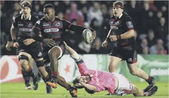  ??  ?? Edinburgh’s late try-scorer Junior Rasolea drives forward with the ball during last night’s dramatic Challenge Cup clash with Stade Francais at BT Murrayfiel­d.